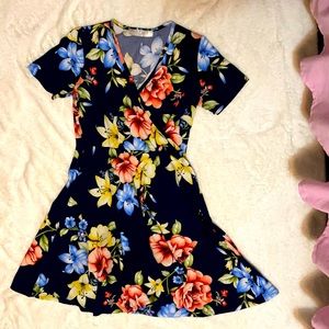 Blue floral dress. 👗 this years favorite dress.